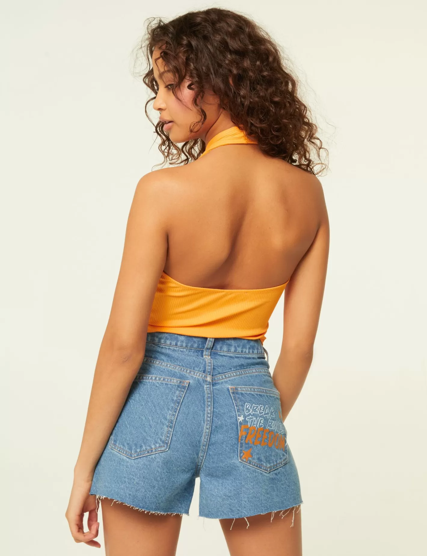 Short avec mix d'imprimés et message bleu et orange^Jennyfer Shop
